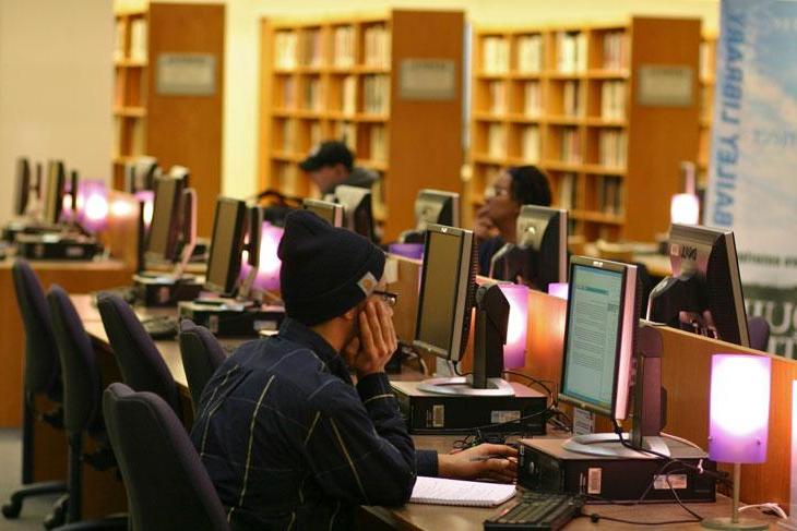 Library student spaces - study tables with computers